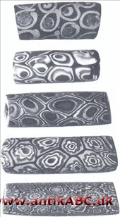 Aggri-perler Venetianske millefiore perler. Fællesbetegnelse for den hærskare af vestafrikanske cylinder- eller ægformede perler af forskellige farver