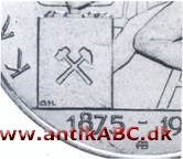 Mærke bestående af krydset minehammer (mukkert) og bjergjern (pikhammer) brugt som vartegn