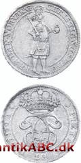 Dansk skuemønt (Hede: 119) præget ca. 1682 i Glückstadt under Chr.5. Mønten havde den latinske randskrift: SI VIGILAND ALII ET ME VIGILARE DECET