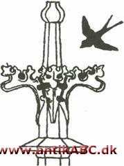 Det firefligede bladværk, der udbreder sig nær spidsen af gotiske spir og fialer - ses også på møbelfialer